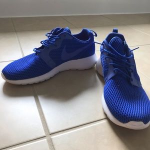 Royal blue Nike Roshes
